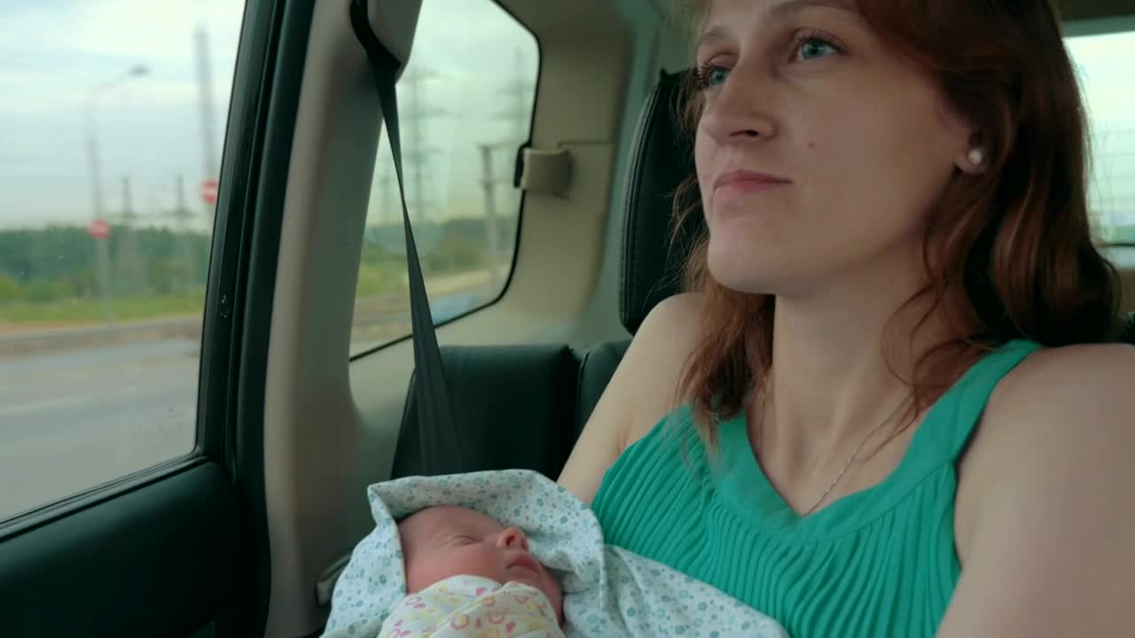 Download Stock Video Mother And Newborn Driving Hom Animated Wallpaper