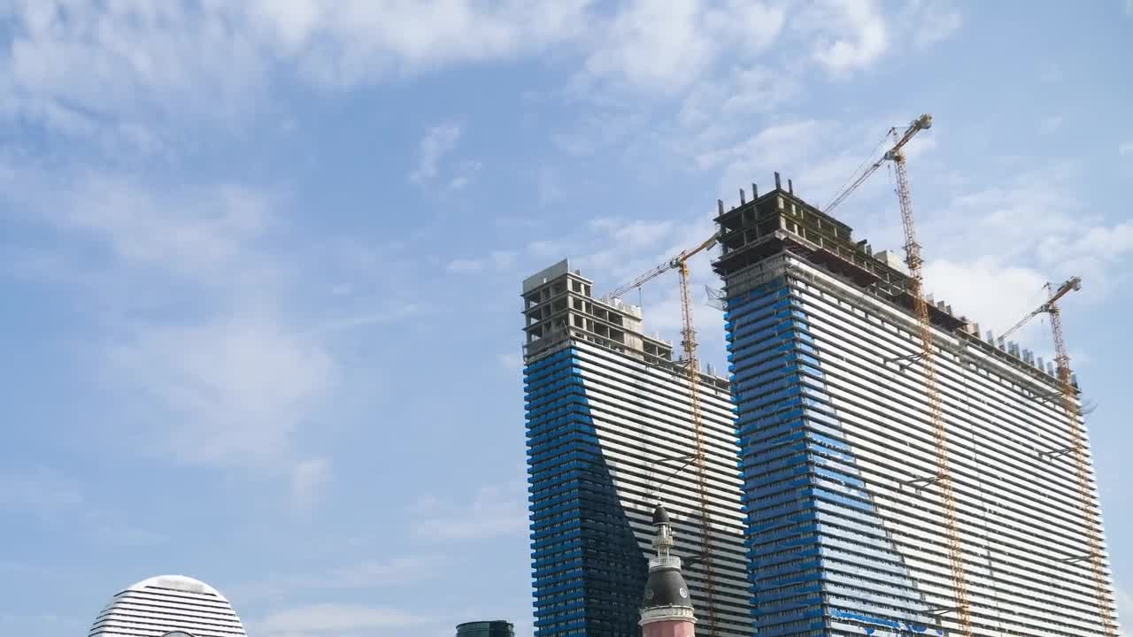 Download Stock Video Modern Skyscrapers Under Construction Time Laps Animated Wallpaper