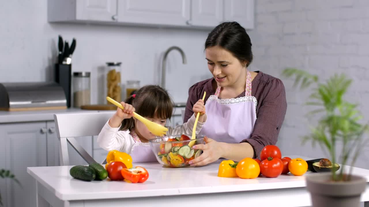 Download Stock Video Mixing Vegetables In The Kitche Animated Wallpaper