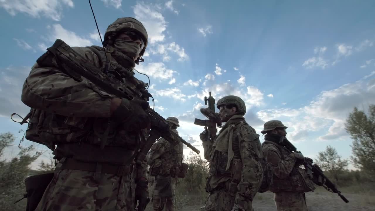 Download Stock Video Military Men Posing Outdoor Animated Wallpaper