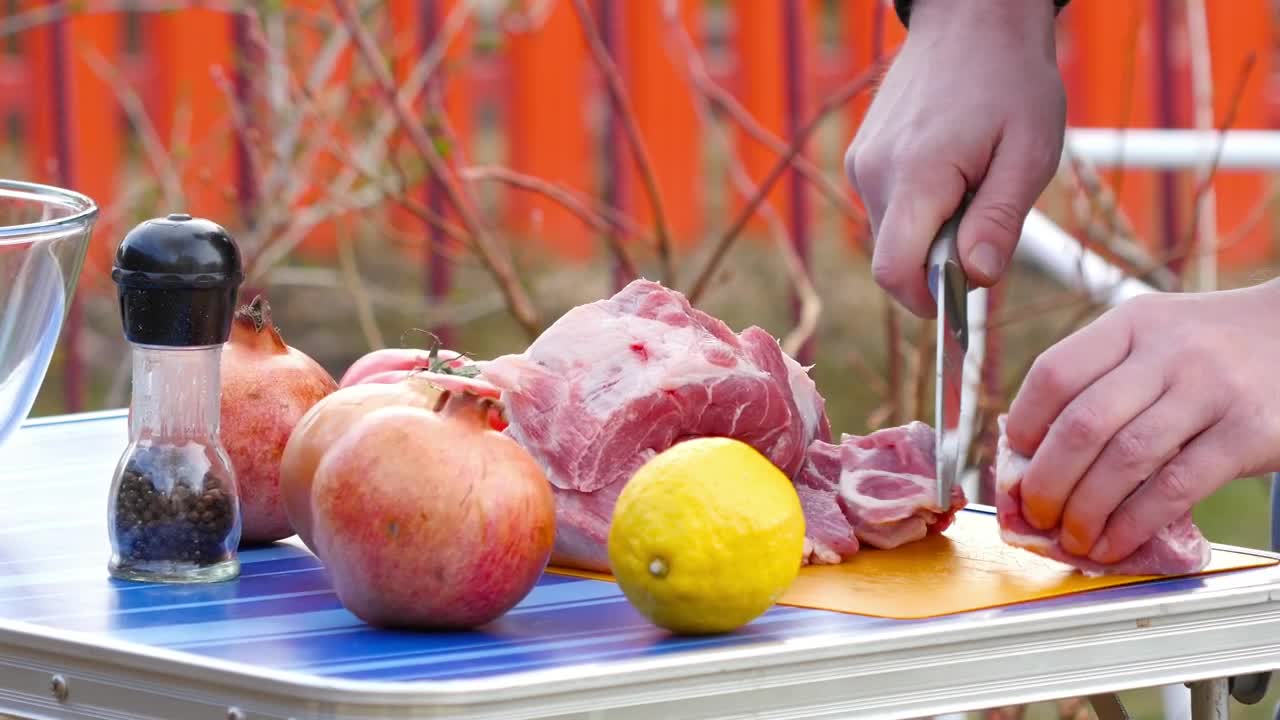 Download Stock Video Men Slicing Meat For Bb Animated Wallpaper