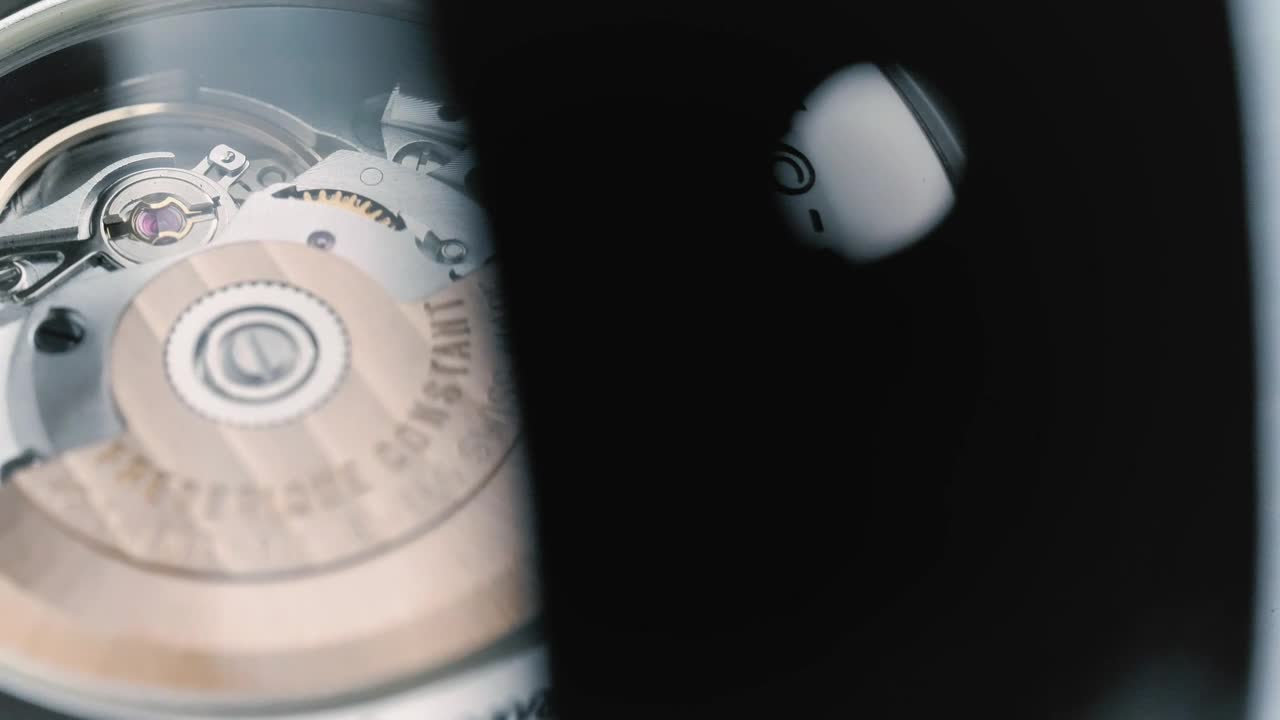 Download Stock Video Mechanism Of A Watch Through A Glas Animated Wallpaper