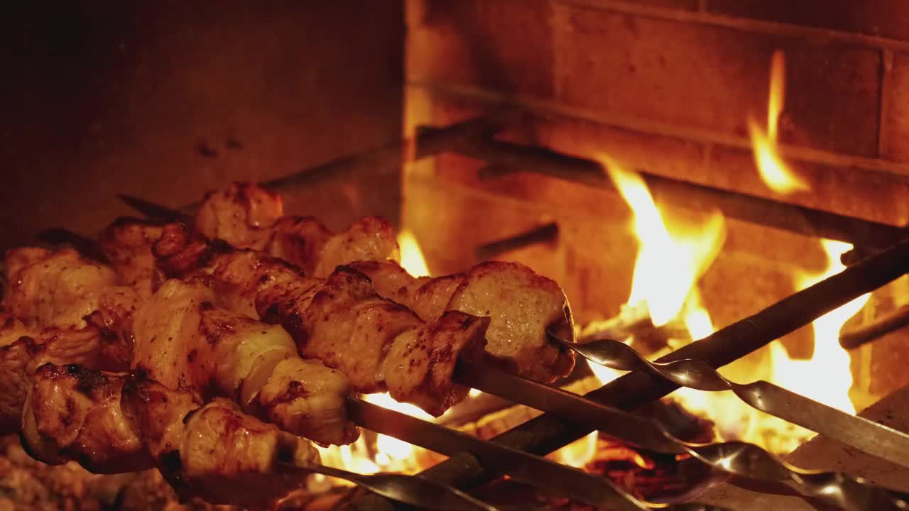 Download Stock Video Meat Skewers Grilling On A Gril Animated Wallpaper