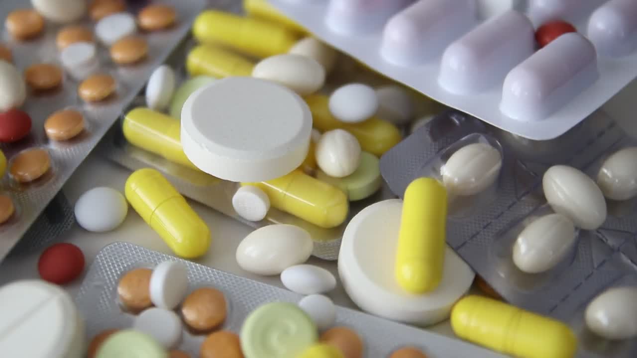 Download Stock Video Many Pills And Drugs Rotating Close U Animated Wallpaper