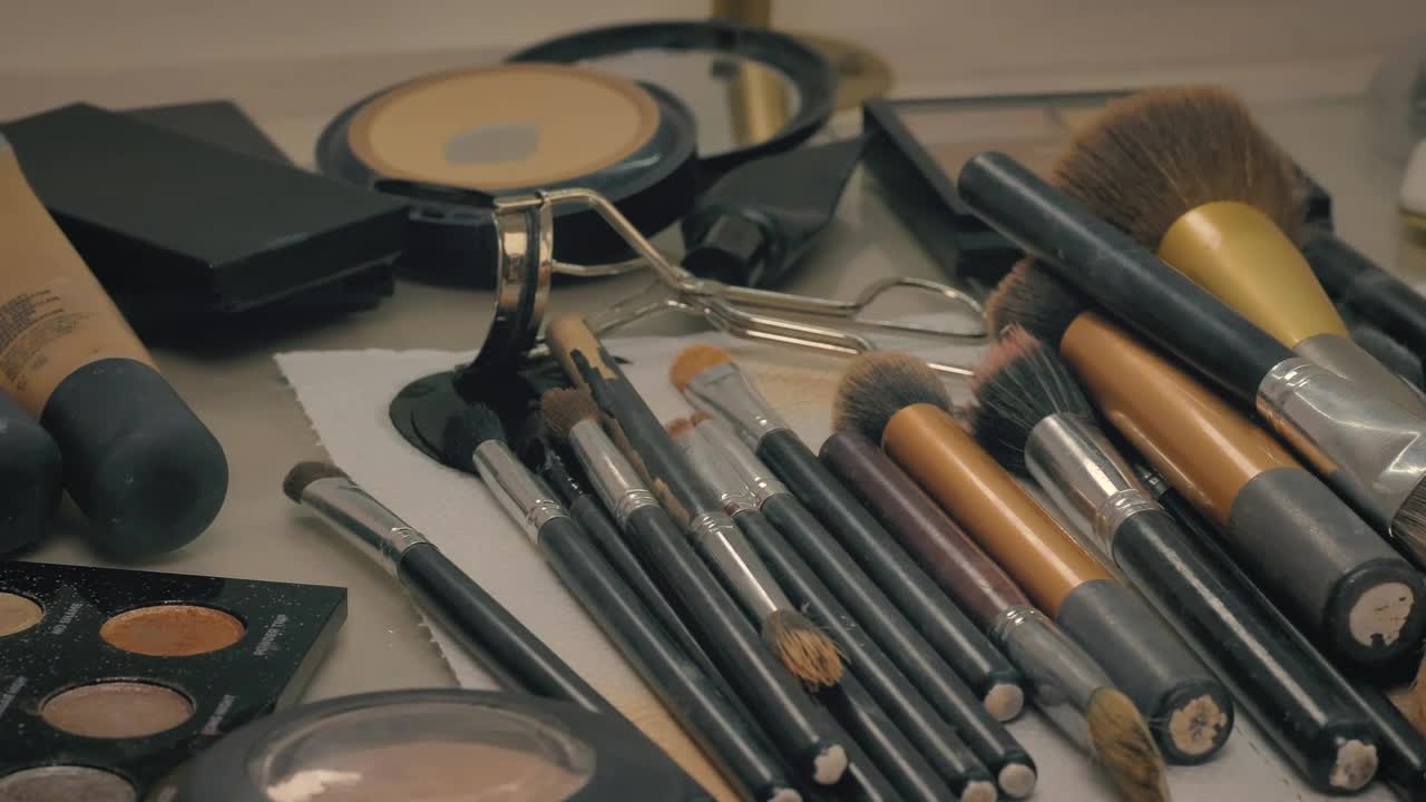 Download Stock Video Many Makeup Items On A Tabl Animated Wallpaper