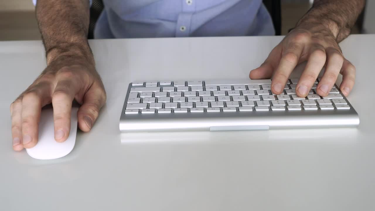 Download Stock Video Mans Hands Typing On A Keyboar Animated Wallpaper