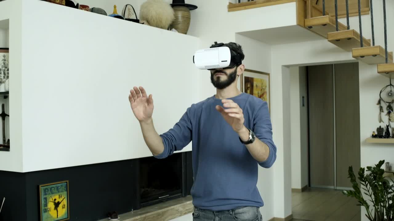 Download Stock Video Man Working In Virtual Reality At Hom Animated Wallpaper