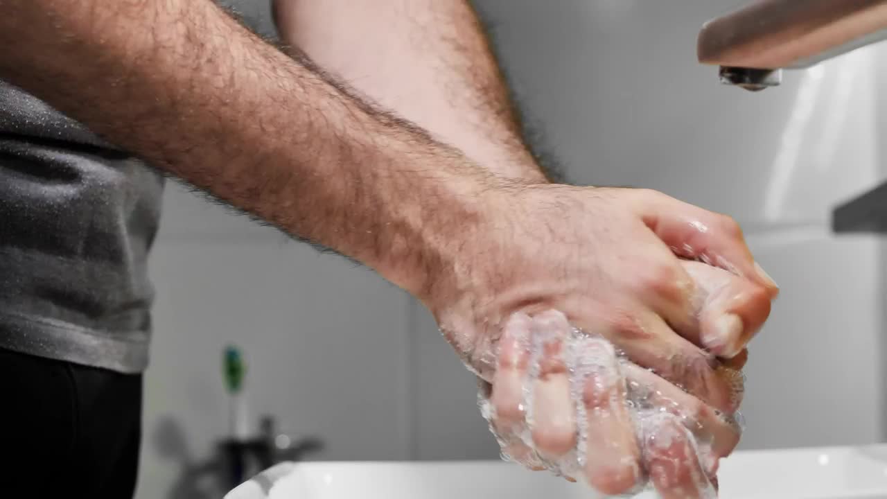 Download Stock Video Man Washing His Hands With Soap Detailed Vie Animated Wallpaper