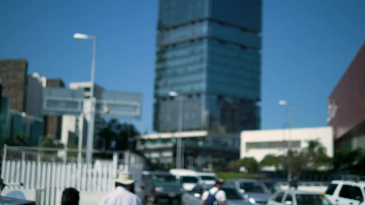 Download Stock Video Man Walking Among Traffic In The Cit Animated Wallpaper