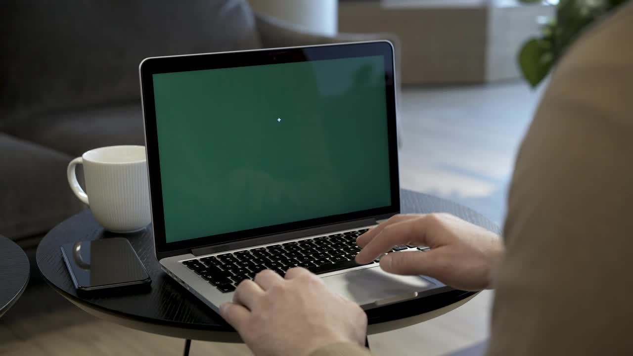 Download Stock Video Man Using The Touchpad On A Lapto Animated Wallpaper