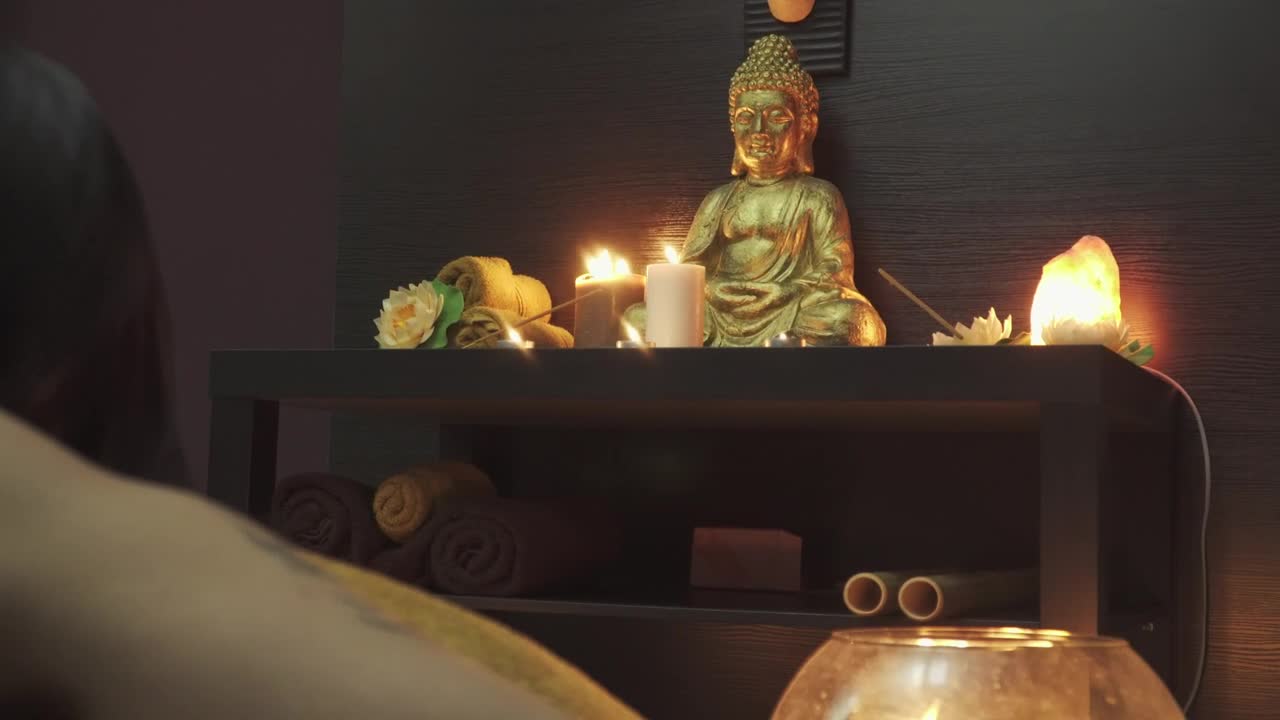 Download Stock Video Man Praying To Candle Lit Buddh Animated Wallpaper