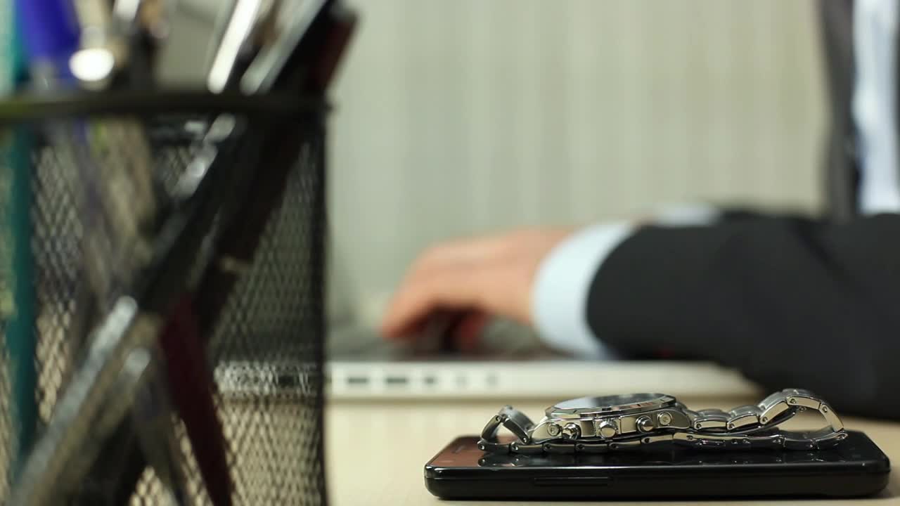 Download Stock Video Man In Suit Working On A Computer In An Offic Animated Wallpaper