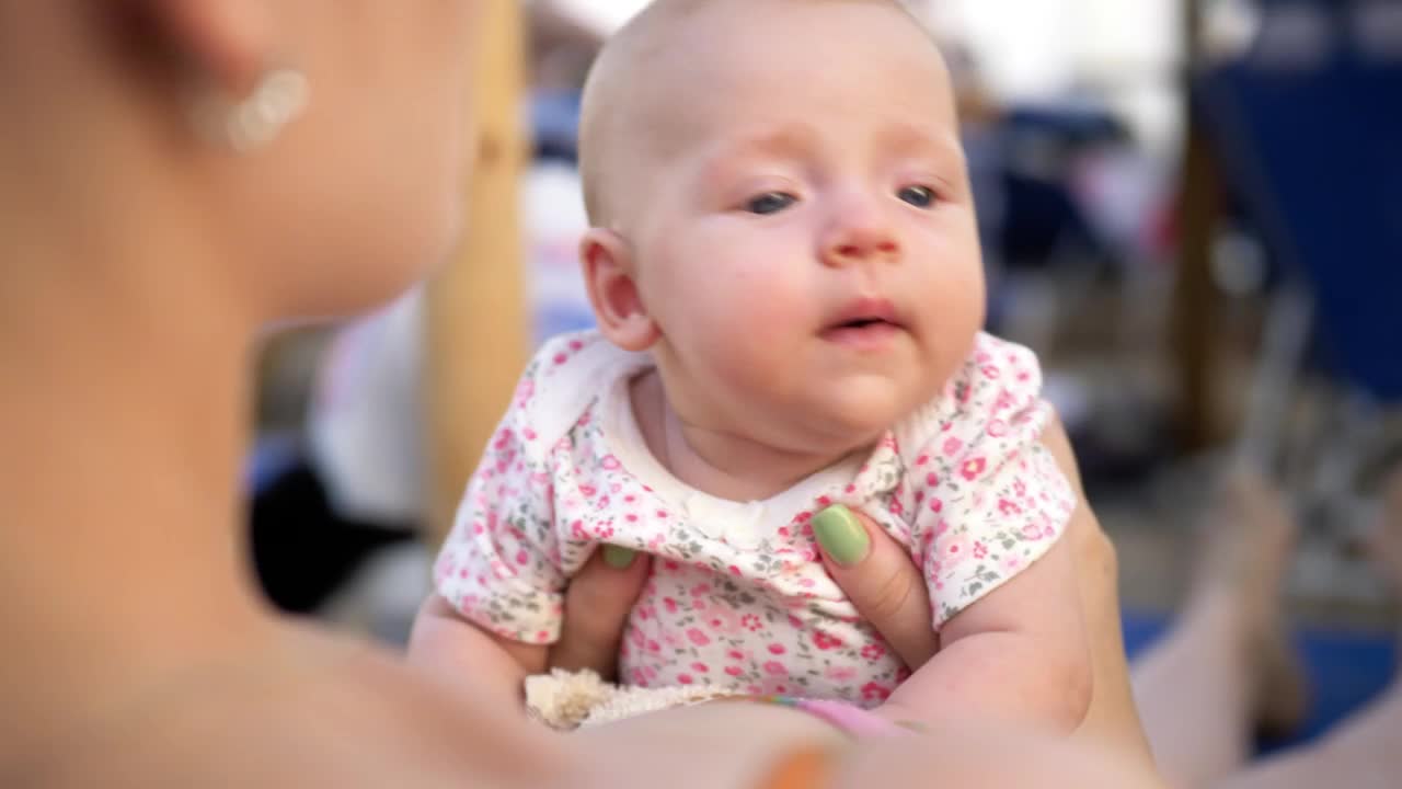 Download Stock Video Mother With Her Infant At The Seaside Live Wallpaper