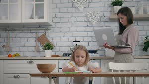 Download Stock Video Mother Working At Home And Cooking Live Wallpaper
