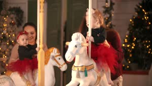 Download Stock Video Mothers Putting Their Babies On A Carousel Live Wallpaper