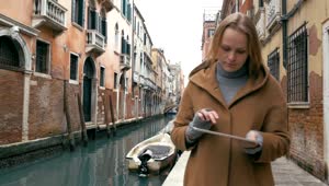 Download Stock Video Navigating Venice Using A Tablet Live Wallpaper