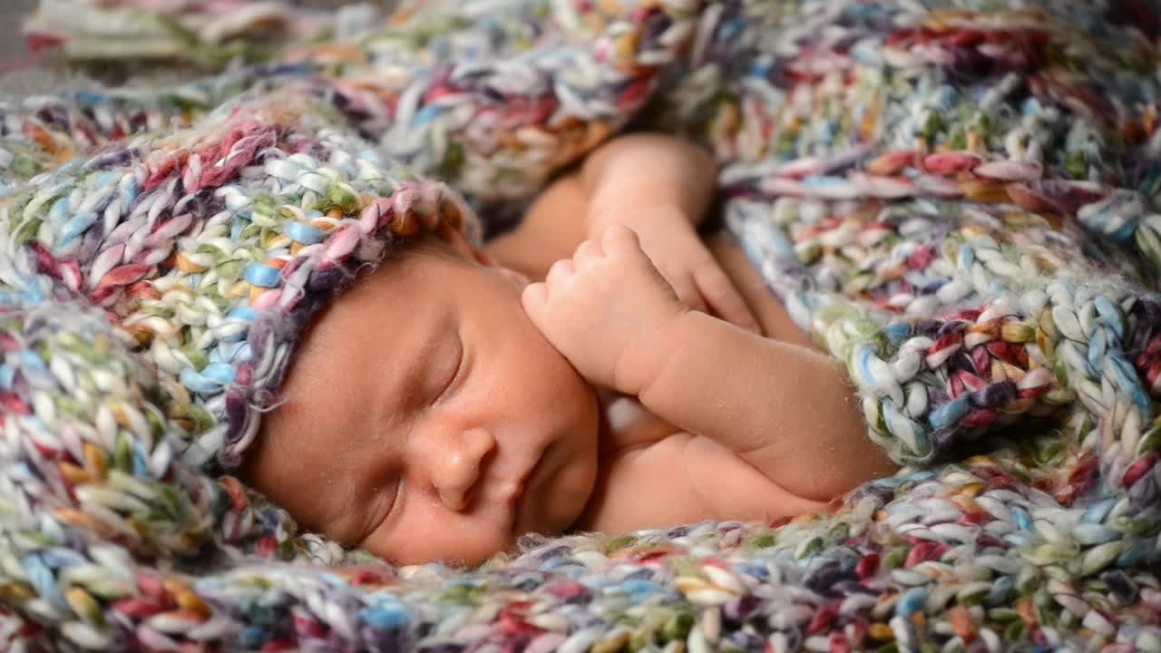 Download Stock Video Newborn Baby Asleep In Blankets Live Wallpaper