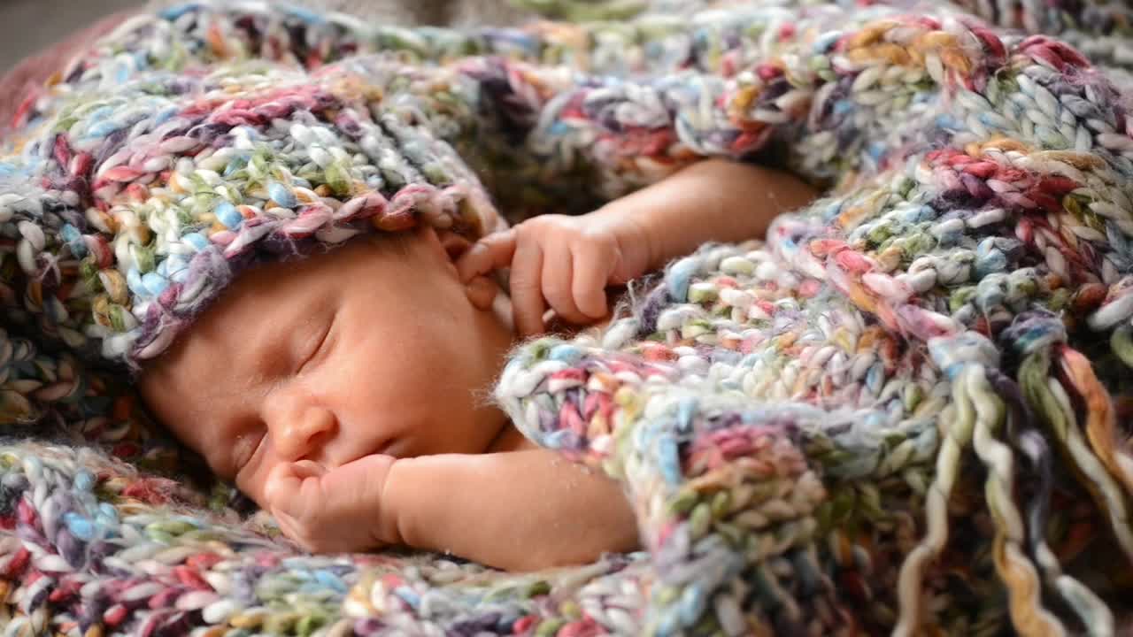 Download Stock Video Newborn Baby Having A Nap Live Wallpaper