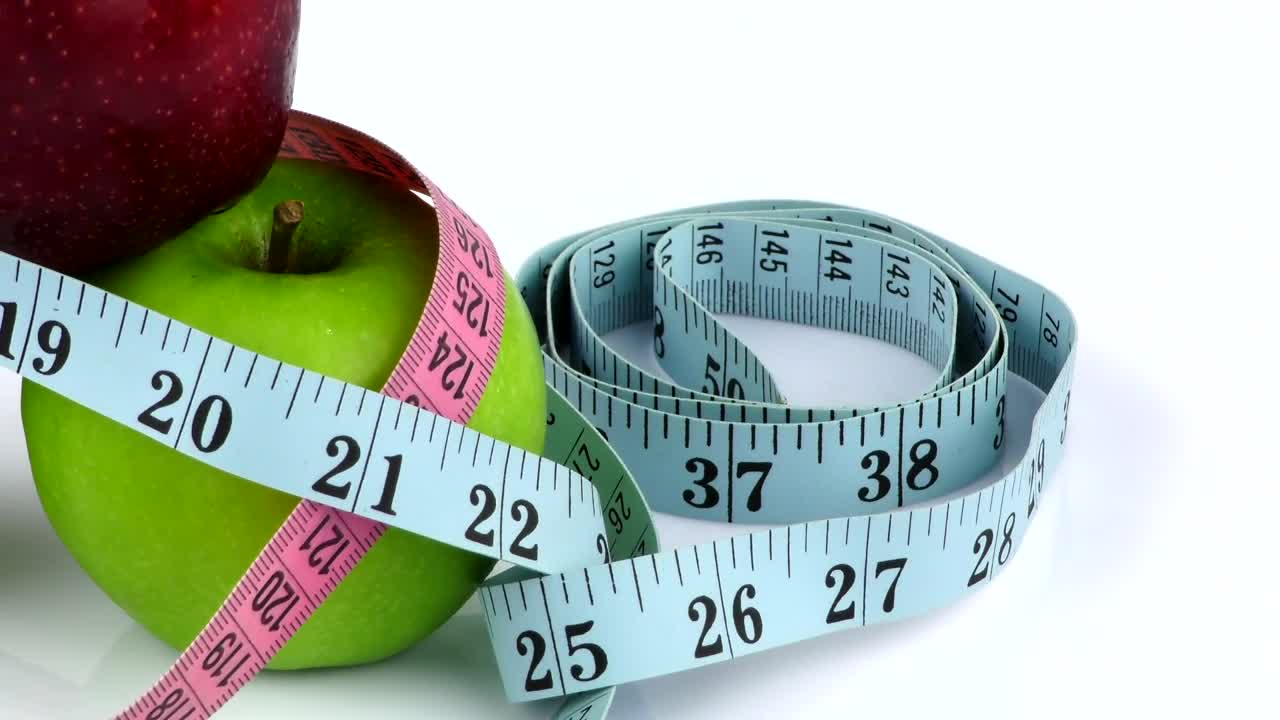 Download Stock Video Nutritionist Measuring Tapes And Apples Live Wallpaper