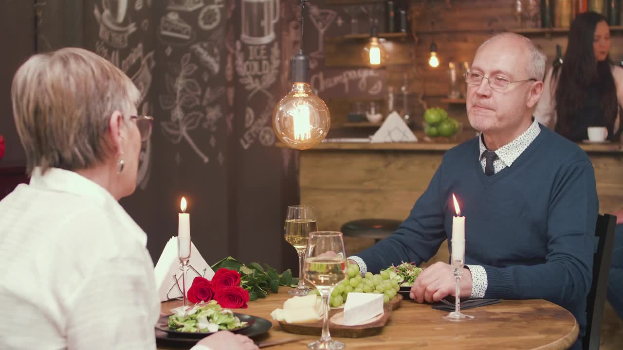 Download Stock Video Older Couple Enjoy Romantic Dinner Date Live Wallpaper