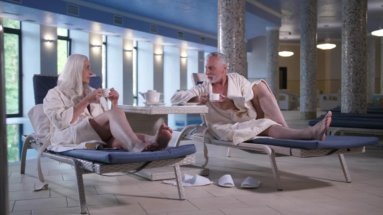 Download Stock Video Older Couple Having A Drink By The Pool Live Wallpaper