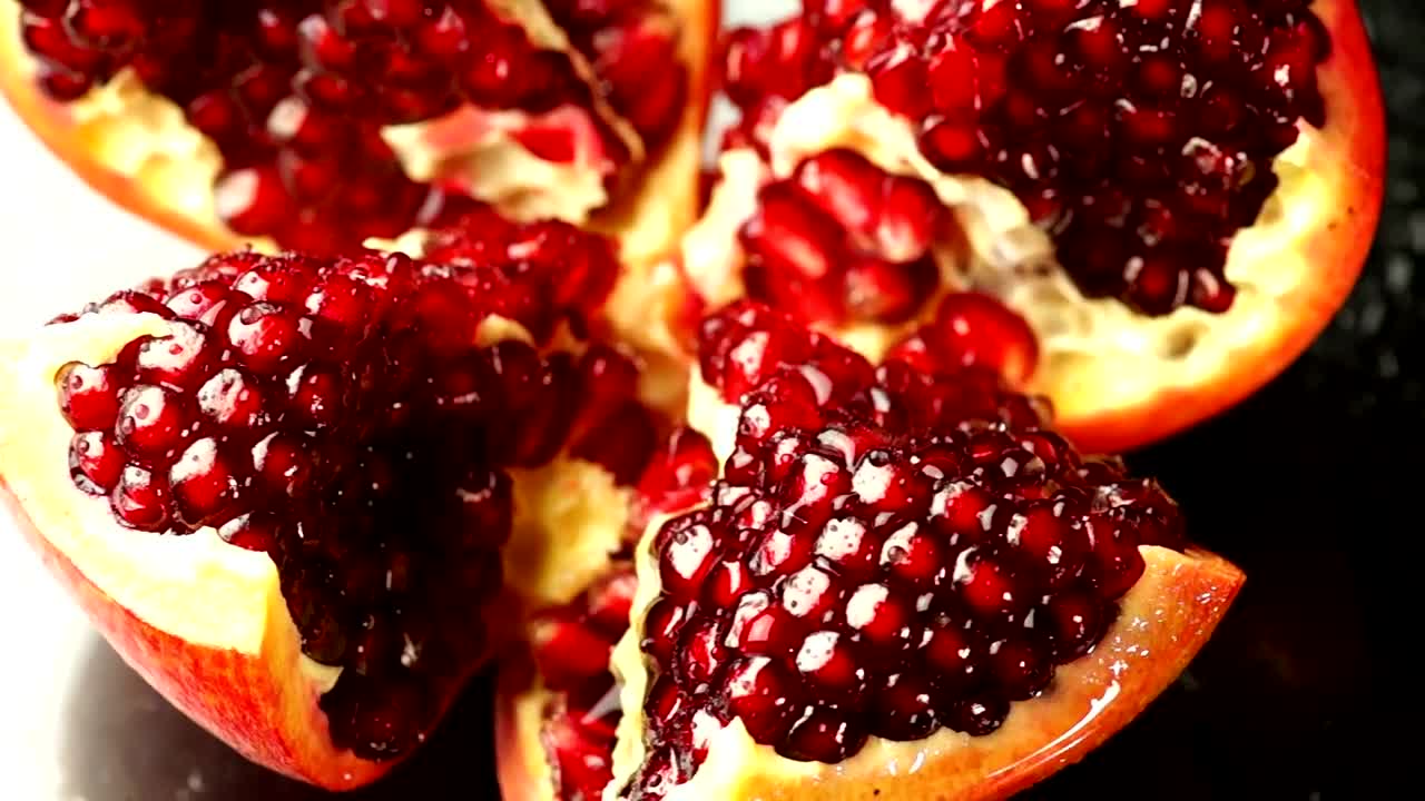 Download Stock Video Open Pomegranate Rotating Live Wallpaper