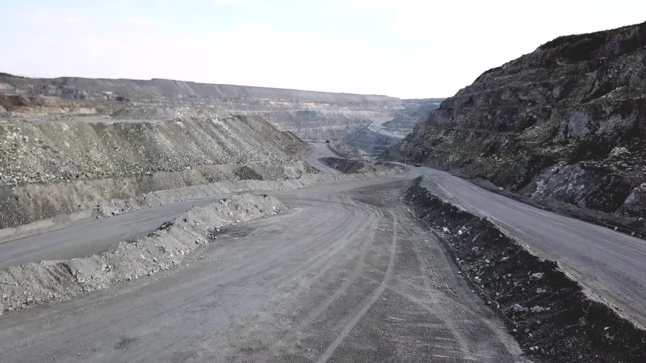 Download Stock Video Orange Truck Heading Through A Quarry Live Wallpaper