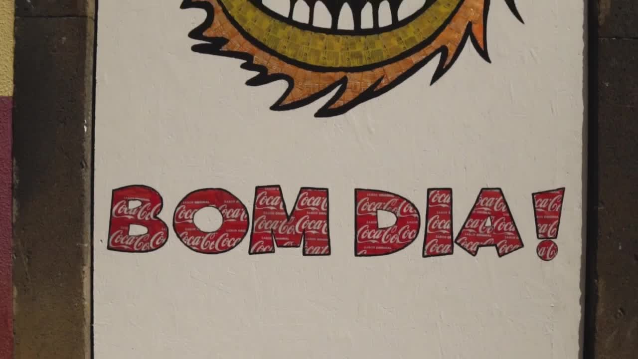 Download Stock Video Painted Sign On A Building With The Words Bom Dia Live Wallpaper