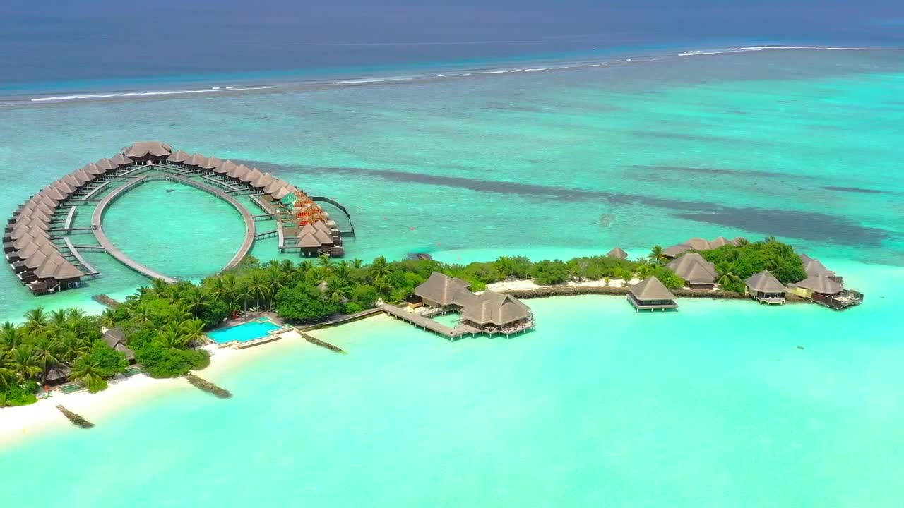 Download Stock Video Paradise Beach With Bungalows Over The Sea Live Wallpaper