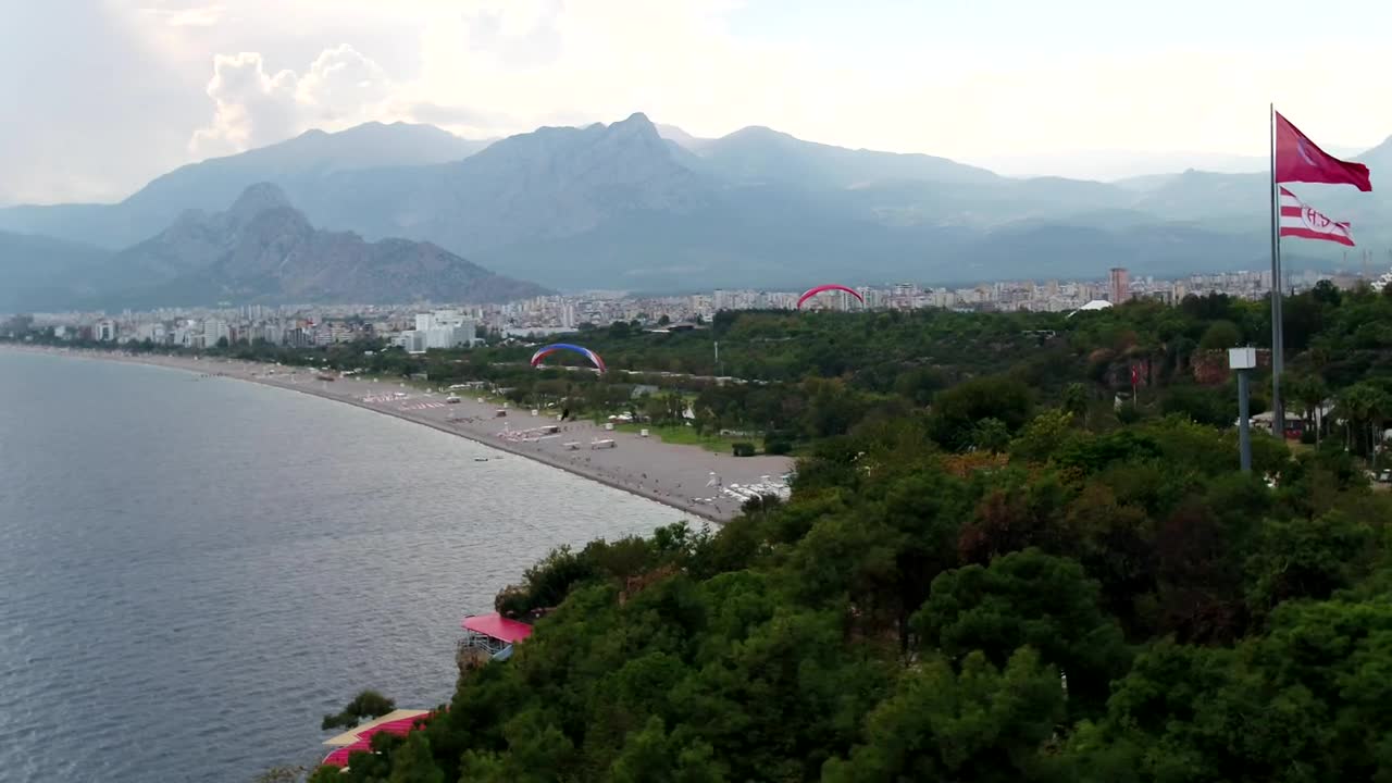 Download Stock Video Paragliding Towards The Beach Live Wallpaper