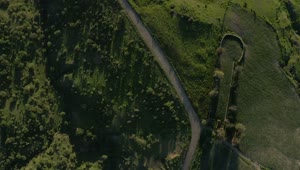 Download Stock Video Path That Crosses A Meadow Aerial Shot Live Wallpaper
