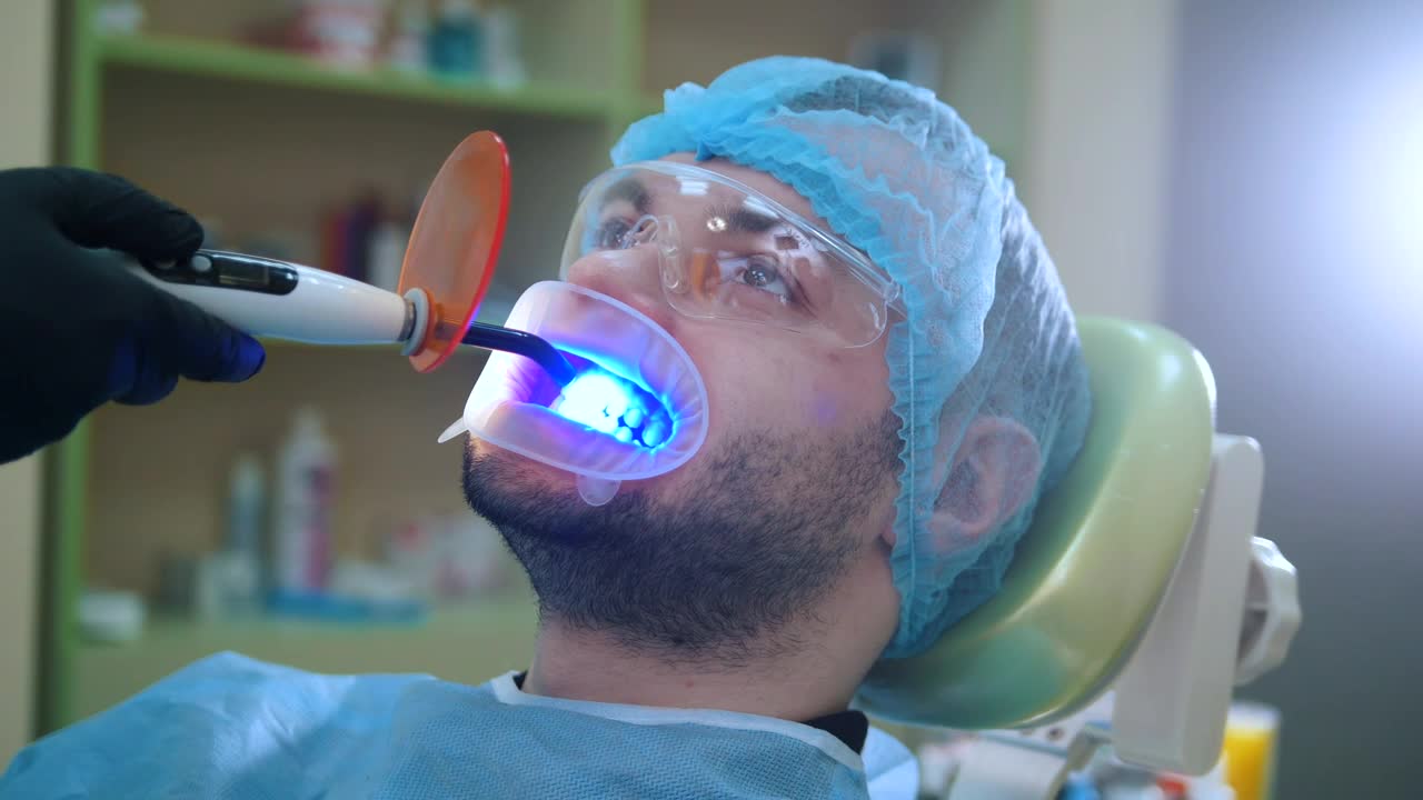 Download Stock Video Patient During A Dental Whitening Session Live Wallpaper