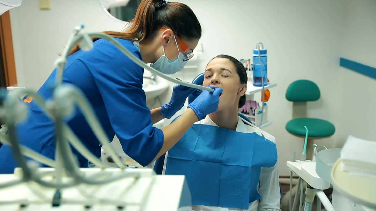 Download Stock Video Patient Receiving Dental Treatment Live Wallpaper