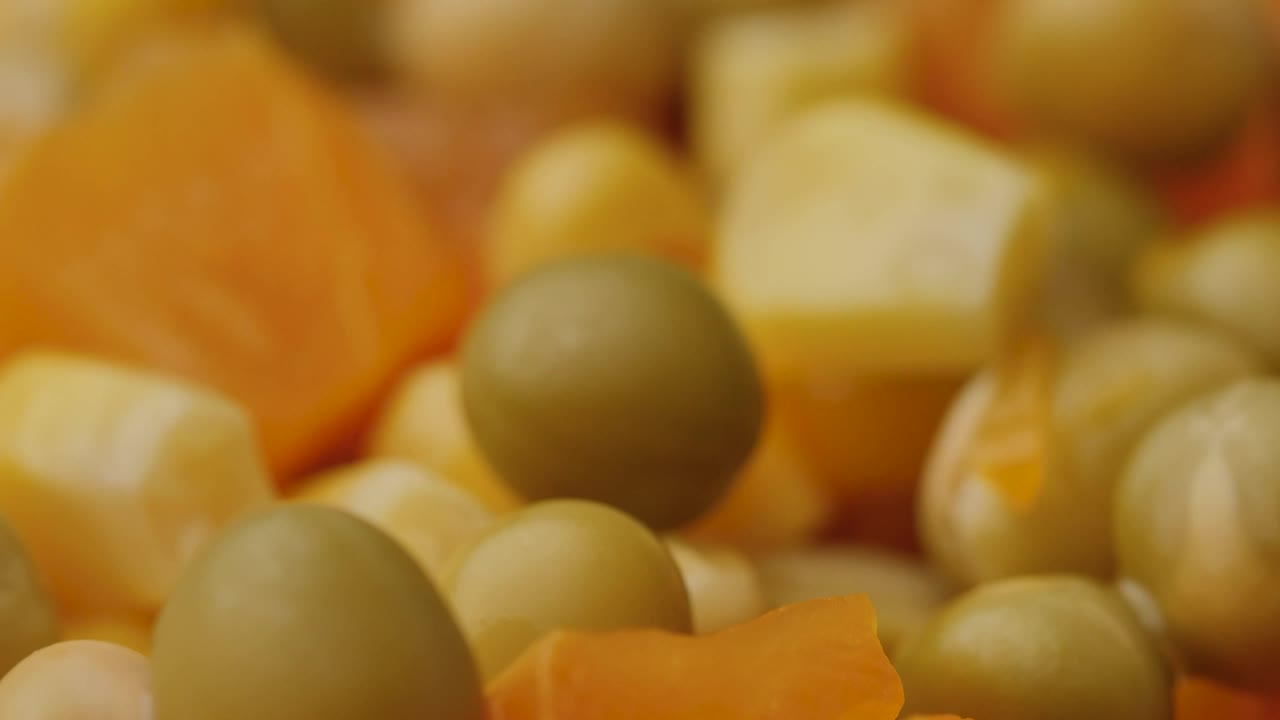 Download Stock Video Peas Corn And Cooked Carrots Seen In A Very Close Live Wallpaper