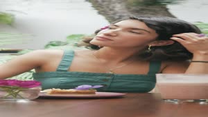 Download Stock Video Pensive Woman Eating A Dessert In A Cafeteria Live Wallpaper