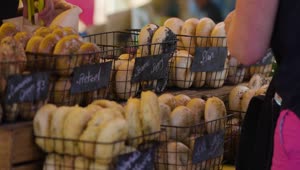 Download Stock Video People Buying Bagels At A Market Live Wallpaper