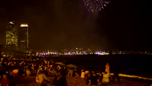 Download Stock Video People Seeing Fireworks In The Beach Live Wallpaper