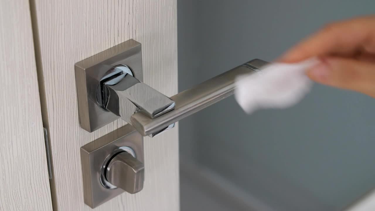 Download Stock Video Person Cleaning A Door Handle Live Wallpaper