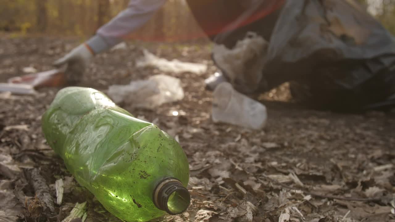 Download Stock Video Person Cleaning Garbage In Nature Live Wallpaper