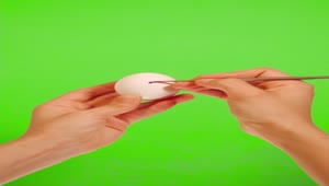 Download Stock Video Person Decorating An Egg With Hearts Live Wallpaper