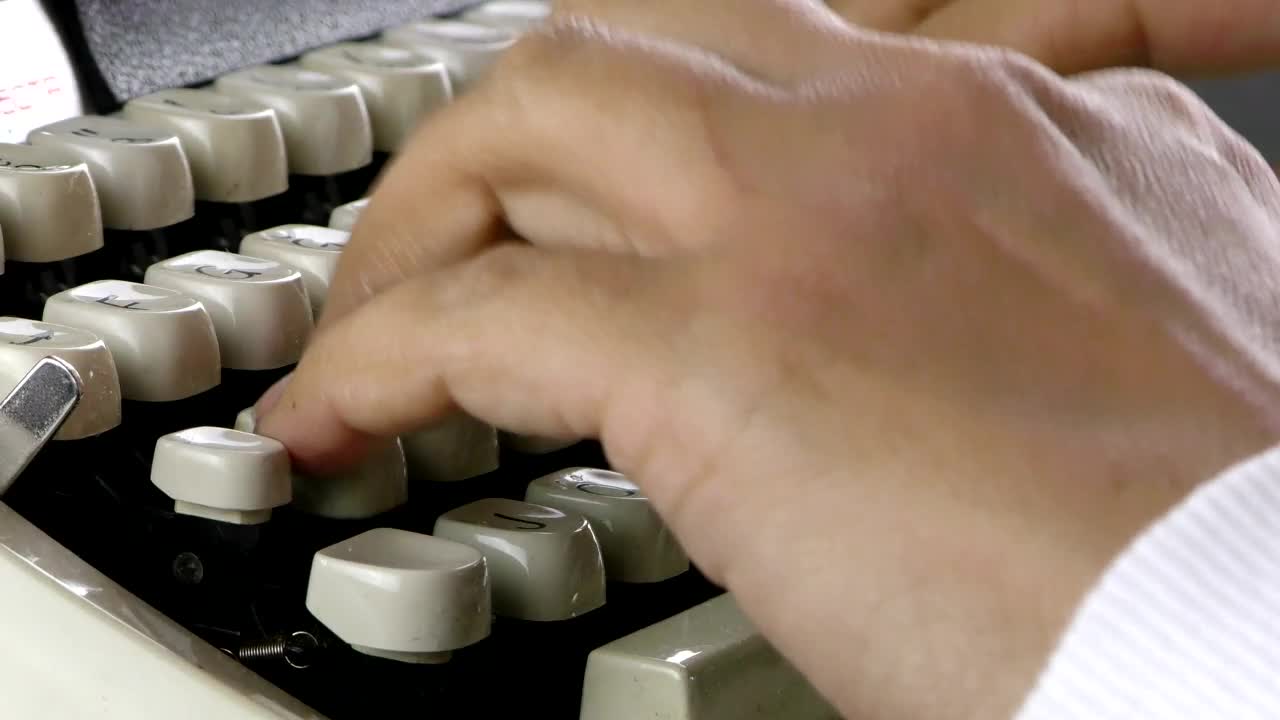 Download Stock Video Person Hands Typing On Typewriter Live Wallpaper