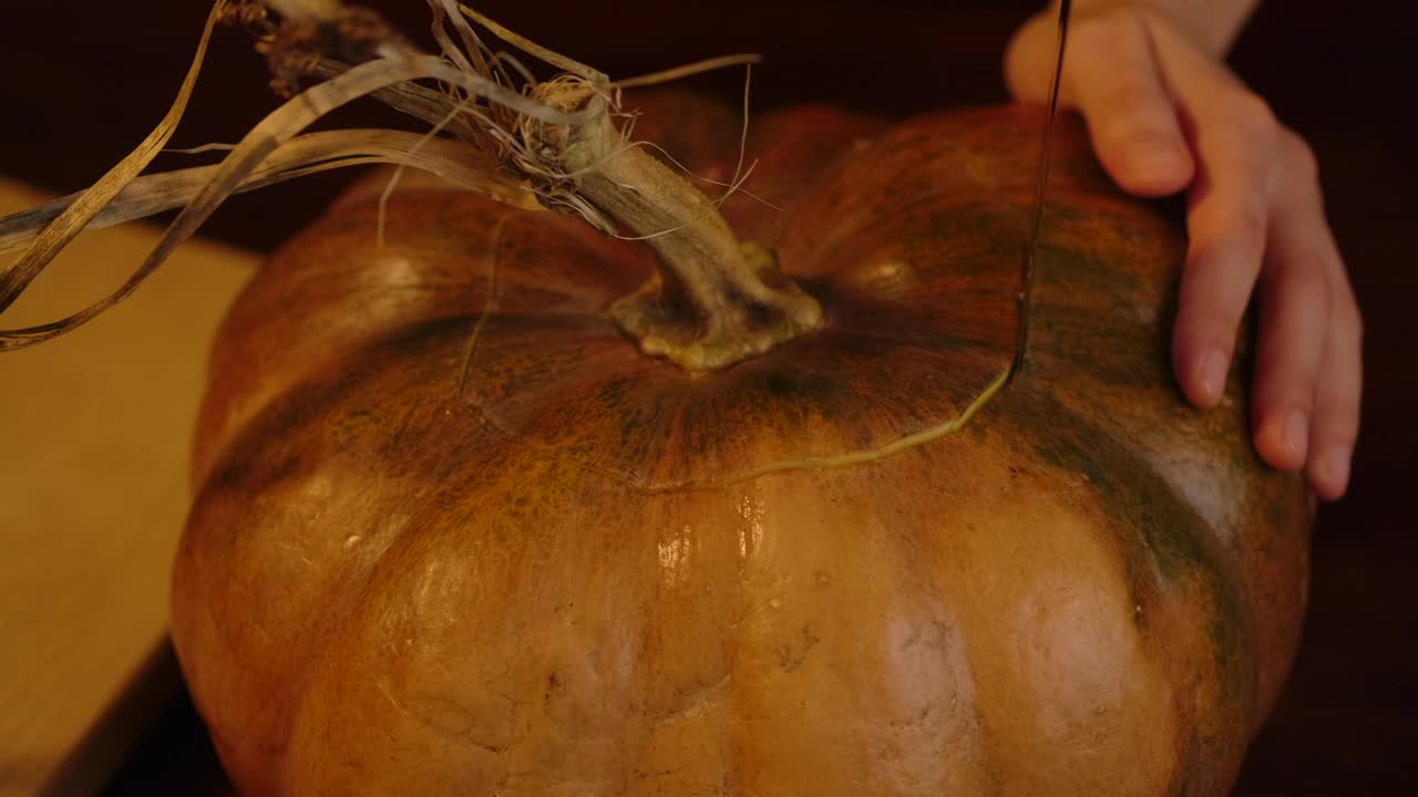 Download Stock Video Person Making A Hole In A Pumpkin For Halloween Live Wallpaper