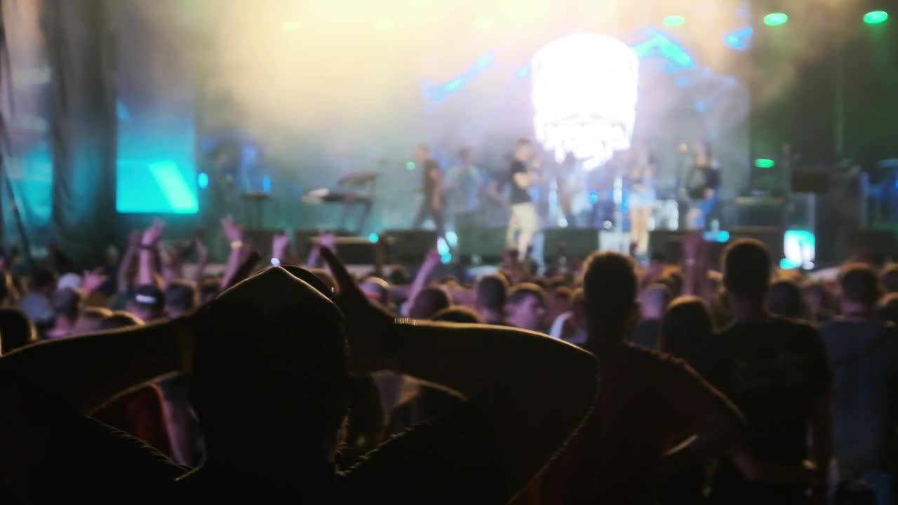 Download Video Stock Person Raising Hands At A Concert Live Wallpaper Free