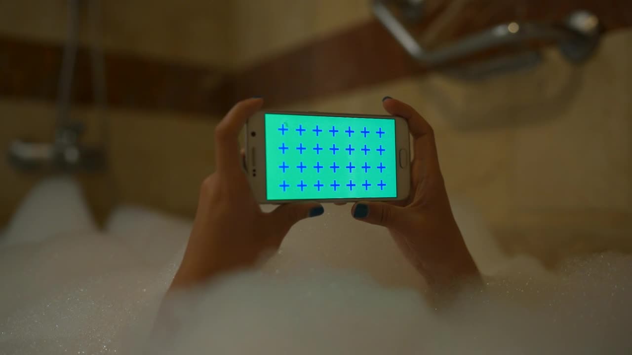 Download Video Stock Person With His Cell Phone In A Foam Bath Live Wallpaper Free