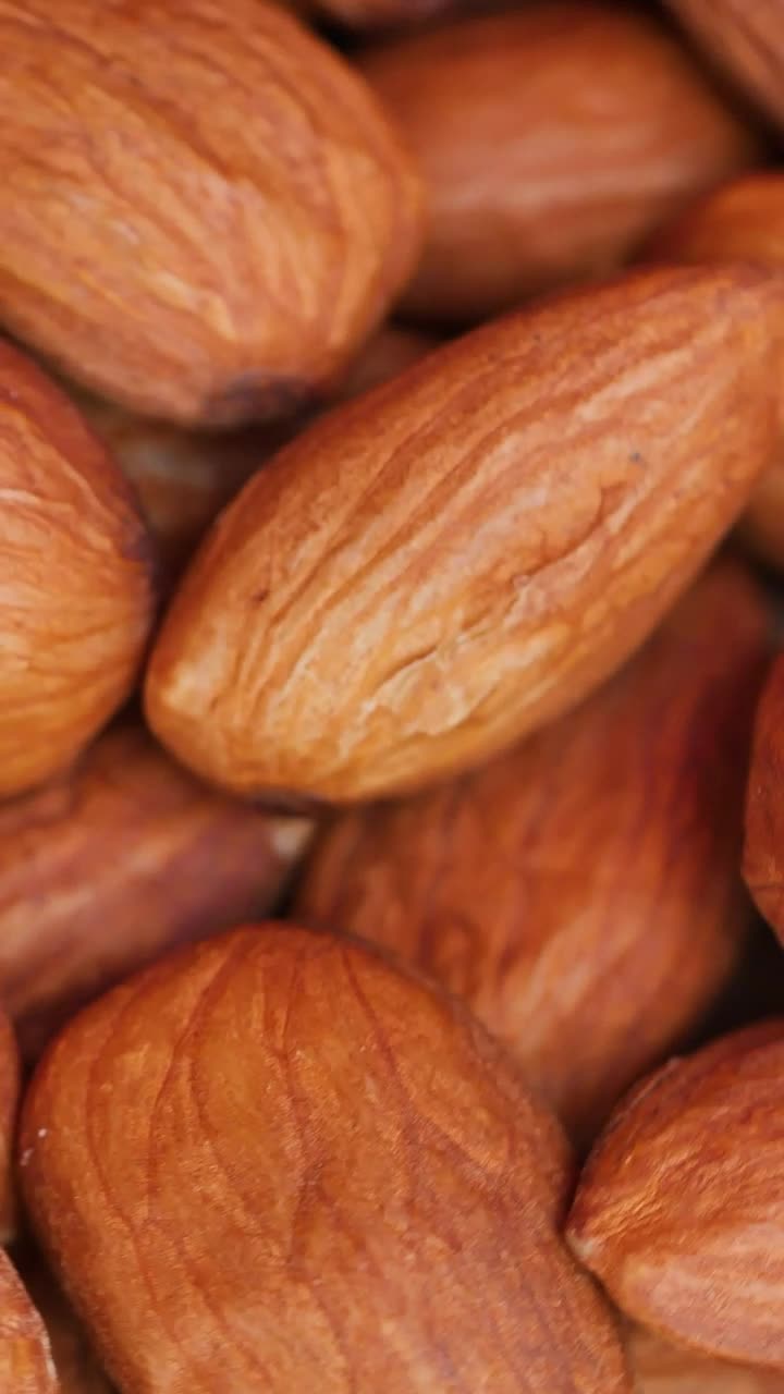 Download Video Stock Piled Almonds Rotating Detailed Views Live Wallpaper Free