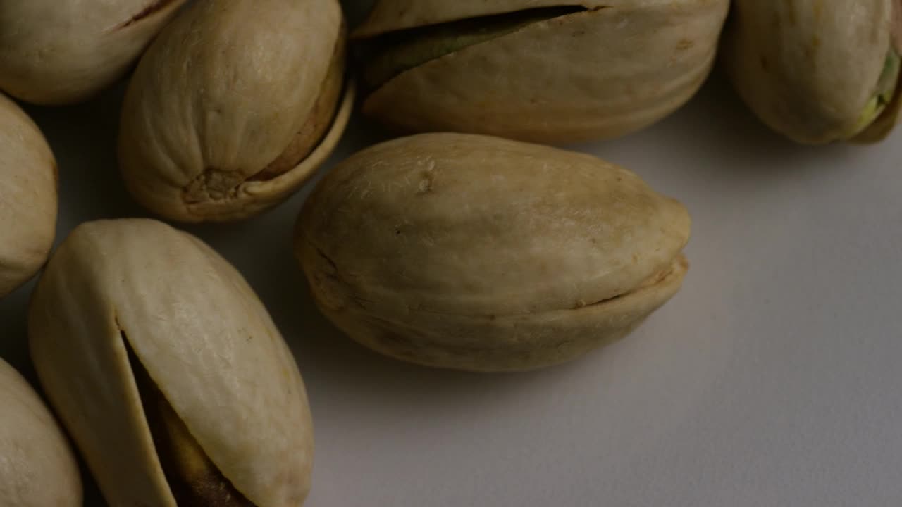 Download Video Stock Pistachios Rotating Close Up Live Wallpaper Free