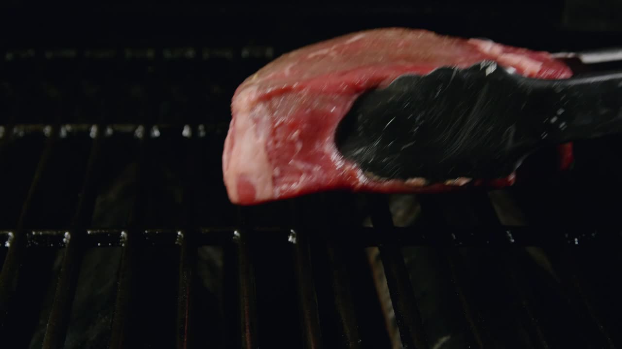 Download Video Stock Placing Beef On A Cold Grill Live Wallpaper Free