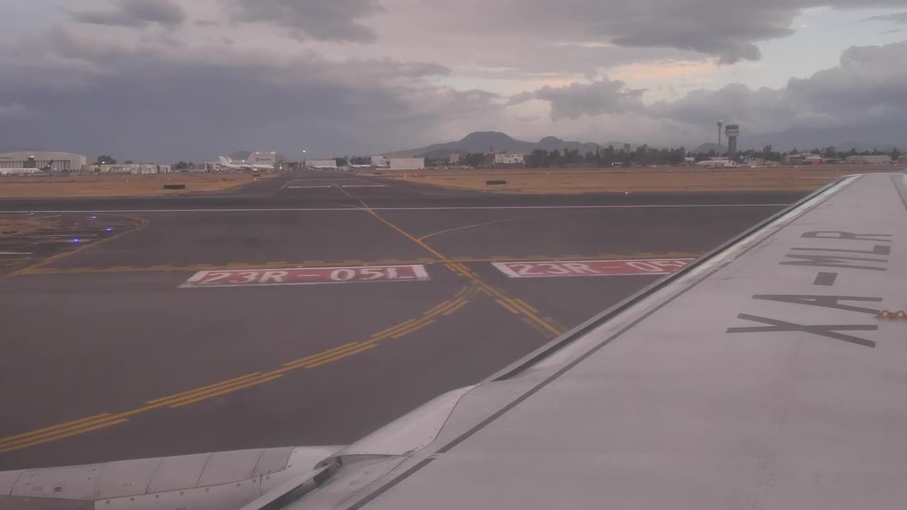 Download Video Stock Plane Taking Off On A Runway View From A Window Live Wallpaper Free