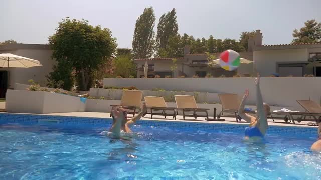 Download Video Stock Playing With A Large Ball In The Pool Live Wallpaper Free