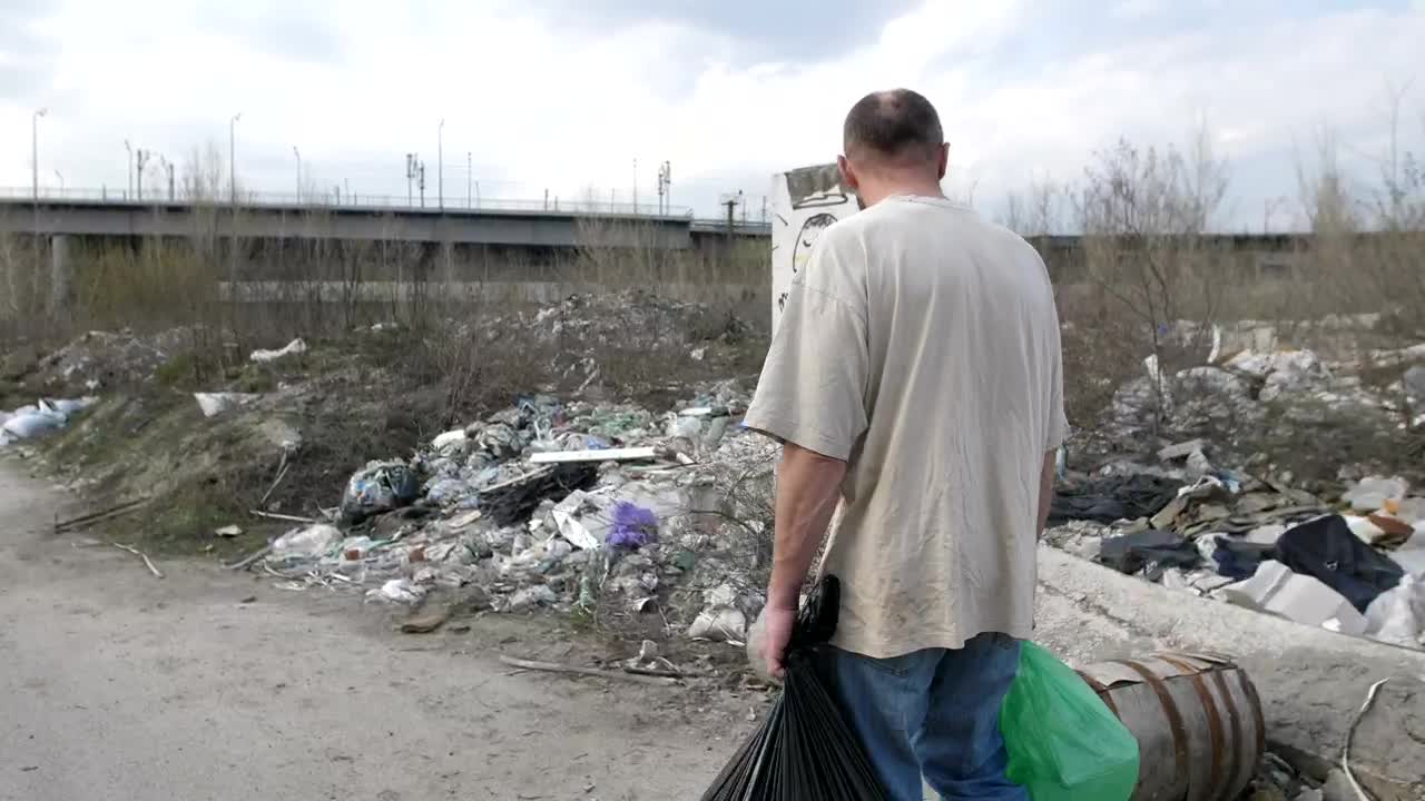 Download Video Stock Poor Man Carrying Trash Bags Live Wallpaper Free